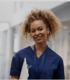 Nurse in scrubs at Nursing School Jersey City